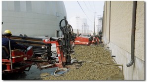 Soil sampling under an existing pharmaceutical company's building. 