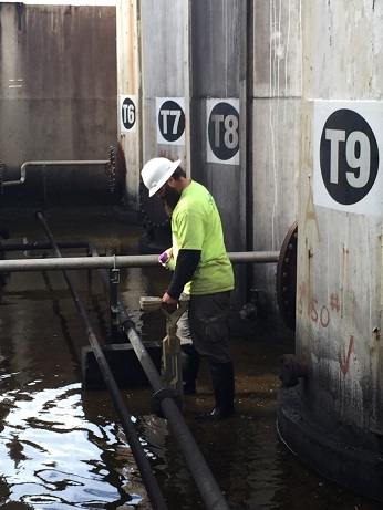 Locating, directional drill bit tracking beneath active ASTs.